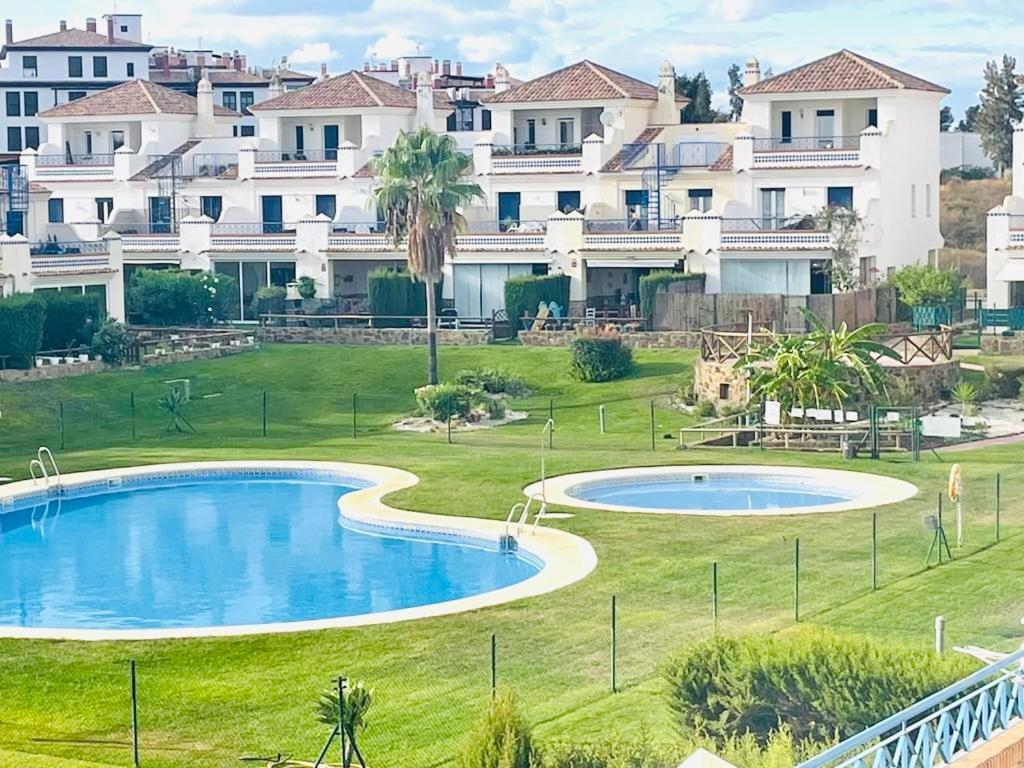 Parque Oasis Costa Esuri Holiday home *